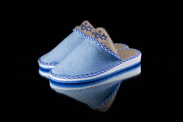 Female Blue Slipper on Black Background, isolated product, comfortable footwear. — Stock Photo, Image