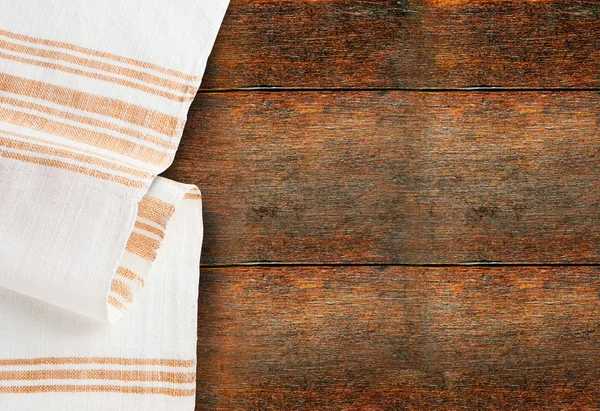 Bordsduk textil på planka bakgrund — Stockfoto