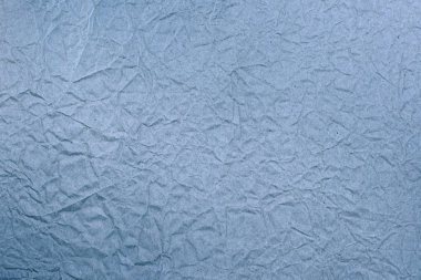 Mavi buruşuk kağıt, arka plan veya dokular için.