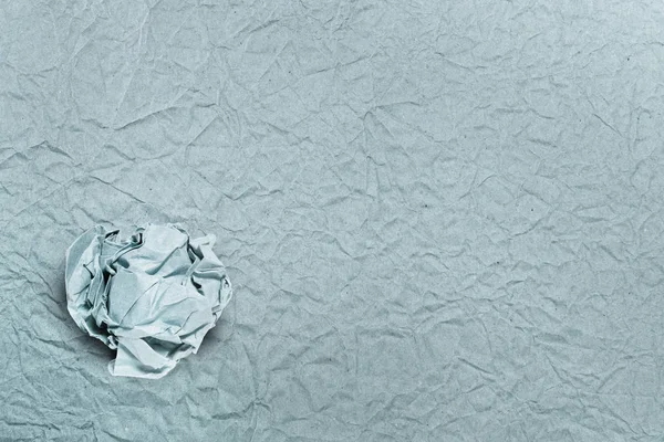 Crumpled paper ball on crumpled paper, for backgrounds or textur — Stock Photo, Image