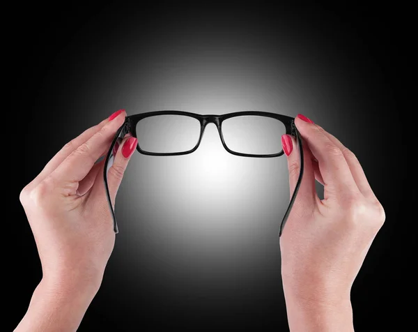 Black Eye Glasses in women's hand — Stock Photo, Image