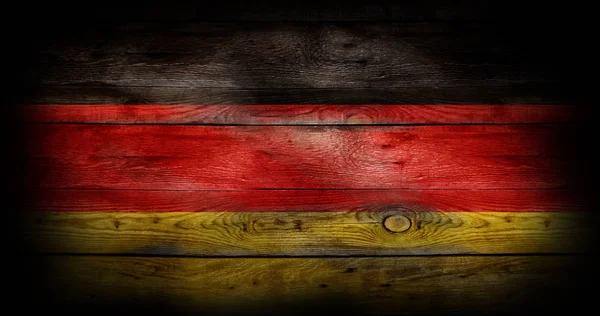Flag of Germany painted on grungy wood plank background — Stock Photo, Image