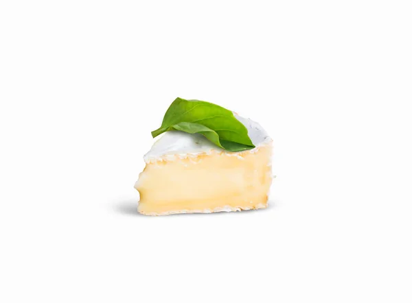 Stuk stinkende camembert kaas op een witte achtergrond — Stockfoto