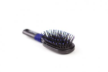 Beyaz bir arka plan üzerinde izole saç tarak