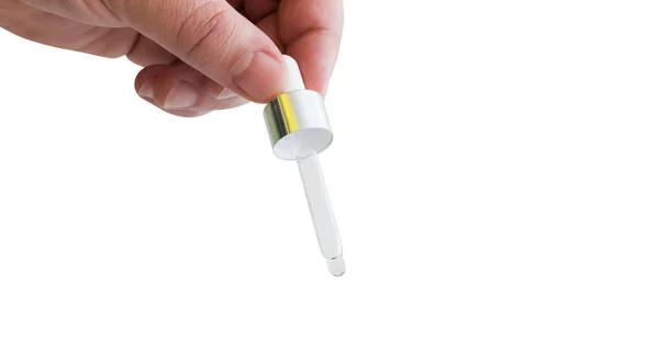 Hand hält eine Medikamentenpipette — Stockfoto