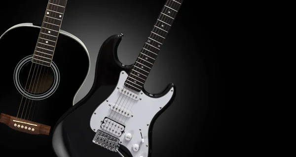 Guitarras acústicas y eléctricas negras sobre fondo negro . — Foto de Stock