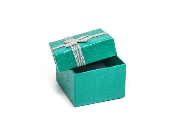 Otwórz Pudełko prezentowe kolor herbaty z srebrny wstążki na białe ba — Zdjęcie stockowe