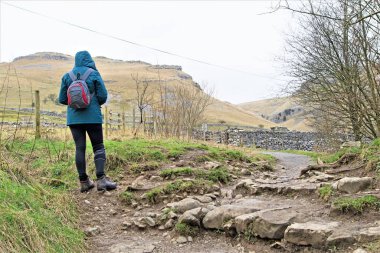 Malham is a fantastic place for hiking and enjoying clean air and spectacular views and vistas.  Janet's Foss, Gordale Scar, Malham Tarn and Malham Cove are all must sees. clipart