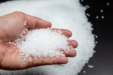 Plastik polimer granüllere yakın çekim. Polimer plastik. bileşik polimer