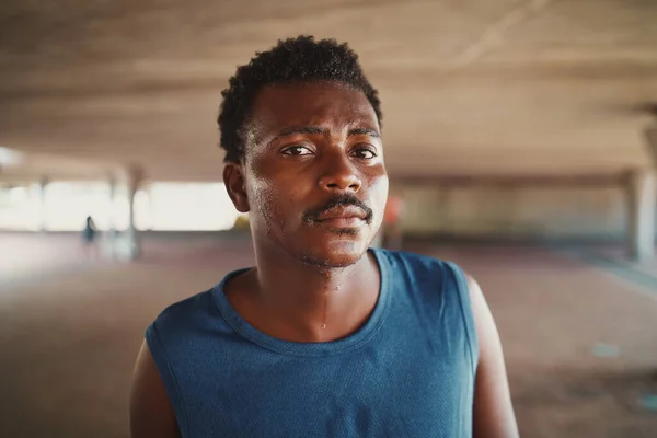 Portrait of sweaty serious handsome young athletic African American man at outdoors looking to camera — 스톡 사진