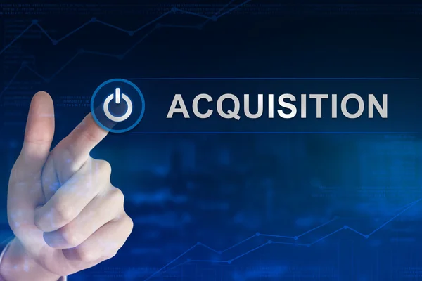Business hand clicking acquisition button — ストック写真
