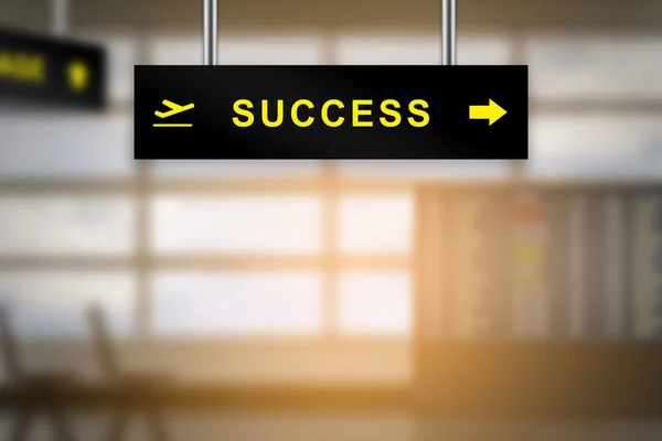 Success on airport sign board — Stock Photo, Image