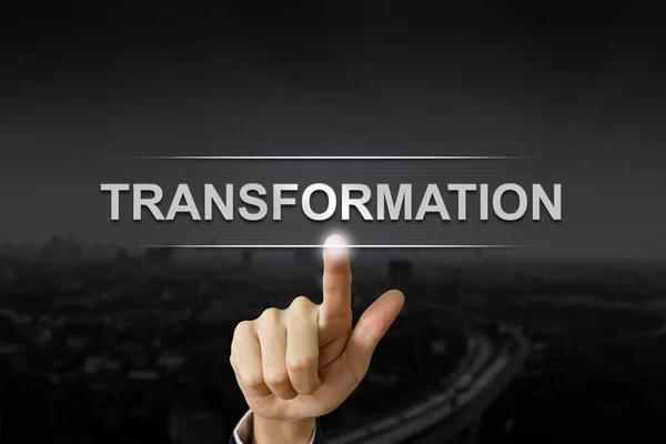 Zakelijke hand duwen transformatie knop — Stockfoto