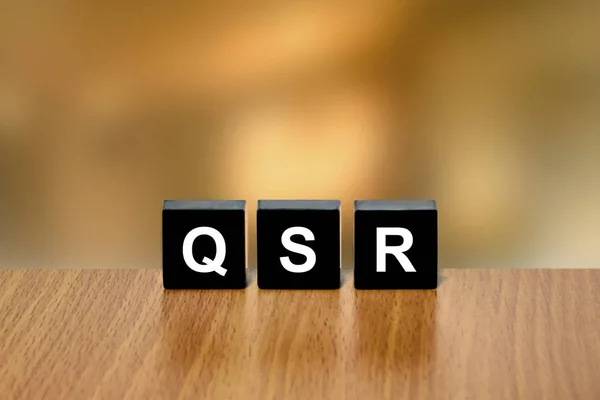 QSR o restaurante de servicio rápido en bloque negro — Foto de Stock