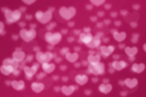 Pink love hearts bokeh blurred background — Stock Photo, Image