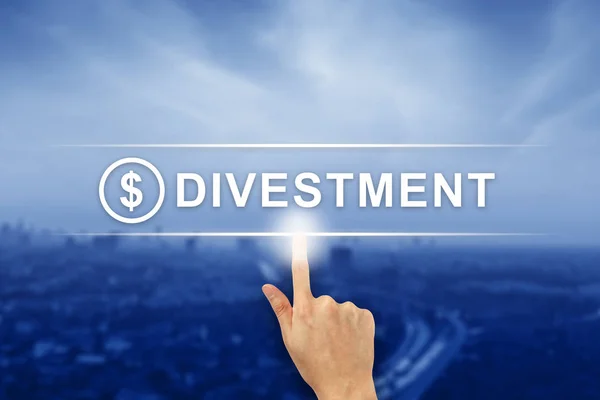 Hand clicking divestment button on touch screen — Stock Photo, Image