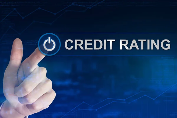 Бизнес нажимает кнопку кредитного рейтинга — стоковое фото