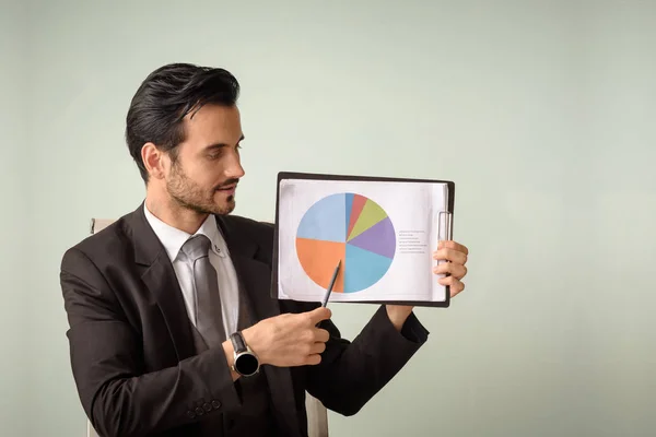 Caucasian businessman present financial performance chart — Stock Photo, Image