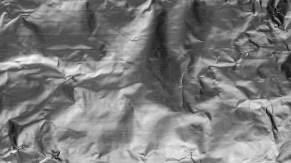 Silver aluminum foil wrinkled paper texture background