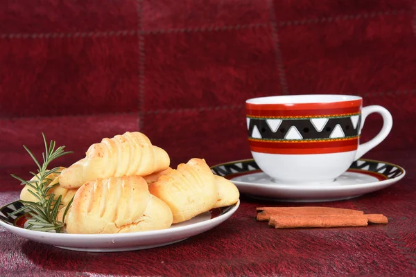 Brazilian snack on the table with cup of tea, cheese biscuit, va — Stock Photo, Image
