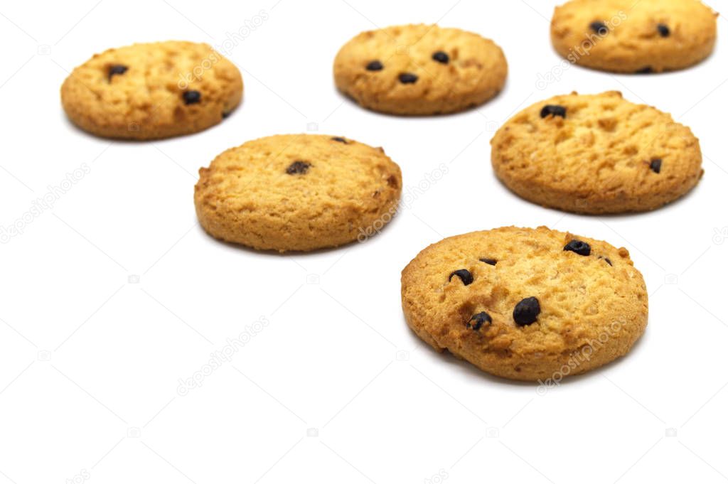 Chocolate chip cookies set on white background. Sweet biscuits delicious and crunchy homemade pastry.