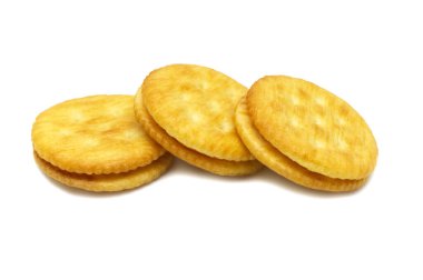 Bisküvi, peynirli kraker, krema ve tereyağı. Bir yığın lezzetli tatlı yemek ve faydalı kurabiyeler. Beyaz arkaplanda izole. 