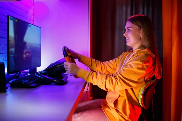 Girl Gamer Playing Racing Computer She Uses Steering Wheel Emotional — Stock Photo, Image