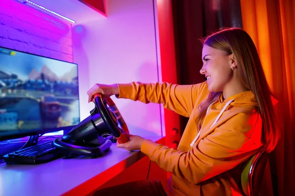 Girl Gamer Playing Racing Computer She Uses Steering Wheel Emotional — Stock Photo, Image