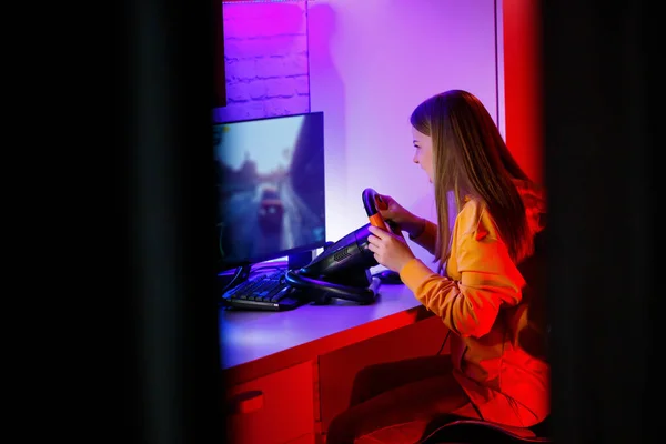 Girl Gamer Playing Racing Computer She Uses Steering Wheel Emotional — Stock Photo, Image