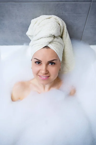 Girl Woman White Towel Her Head Lies Bathroom White Bath — Stock Photo, Image