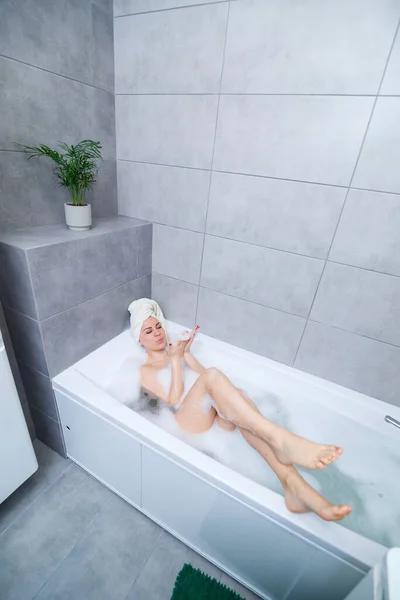 Girl Woman White Towel Her Head Lies Bathroom White Bath — Stock Photo, Image