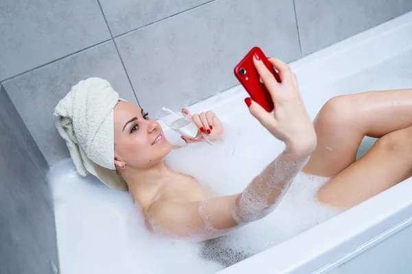 Girl Woman Towel Her Head Lies Glass Champagne White Bathtub — Stock Photo, Image