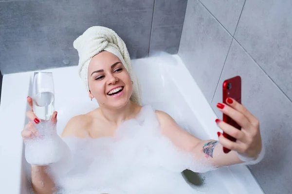 Girl Woman Towel Her Head Lies Glass Champagne White Bathtub — Stock Photo, Image