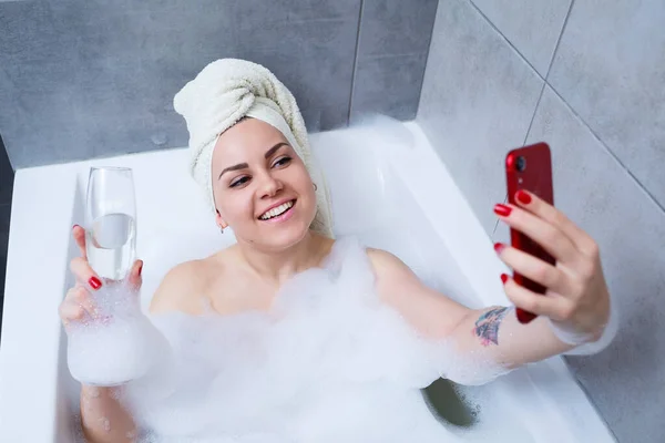 Girl Woman Towel Her Head Lies Glass Champagne White Bathtub — Stock Photo, Image