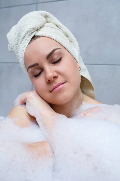 Girl Woman White Towel Her Head Lies Bathroom White Bath — Stock Photo, Image