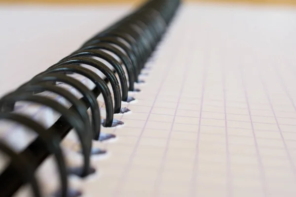 Closeup of metal binding notebook