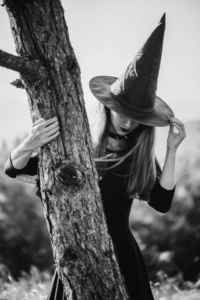 Halloween witch walking outdoor — Stock Photo, Image