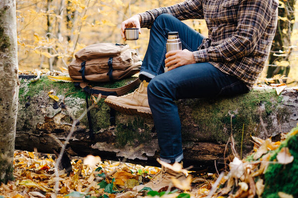 Man resting in autumn outdoor. 