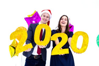 Mutlu yıllar 2020 konsepti. Çift çalışma yaşında bir iş elbisesi. 