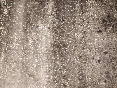 Zemin dokusu üzerine eski, soyut, koyu beton duvar arkaplanı