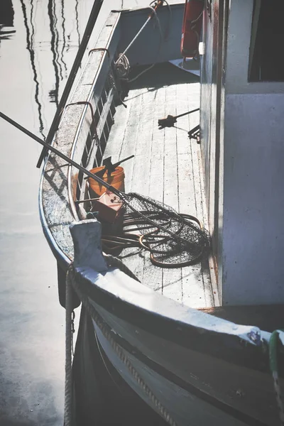 Old wooden shabby fishing boat in the harbor of Trieste — Stockfoto