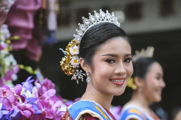 CHIANG MAI, THAILAND - FEBRUARY 08, 2020: Beauty queen contestants sitting on float during parade on Chiang Mai 44th Flower Festival in Chiang Mai, Thailand