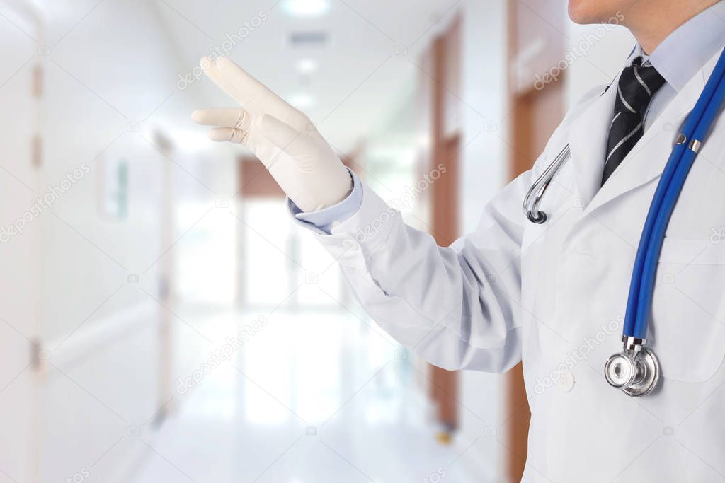concept doctor touch something for cure in hospital background
