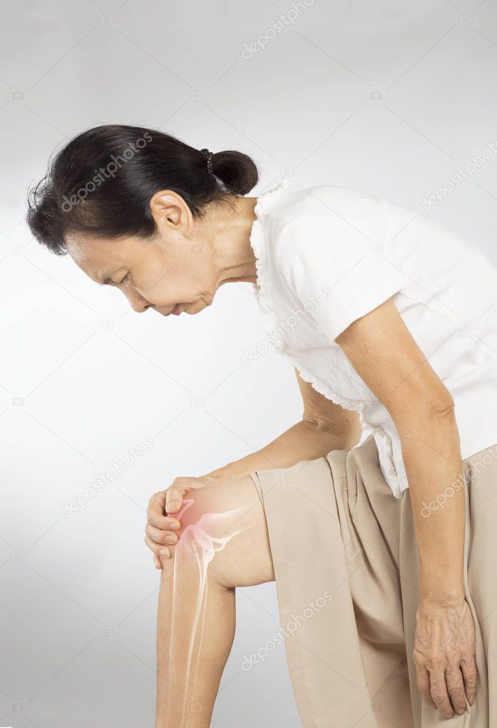 old asian woman touch knee bones pain