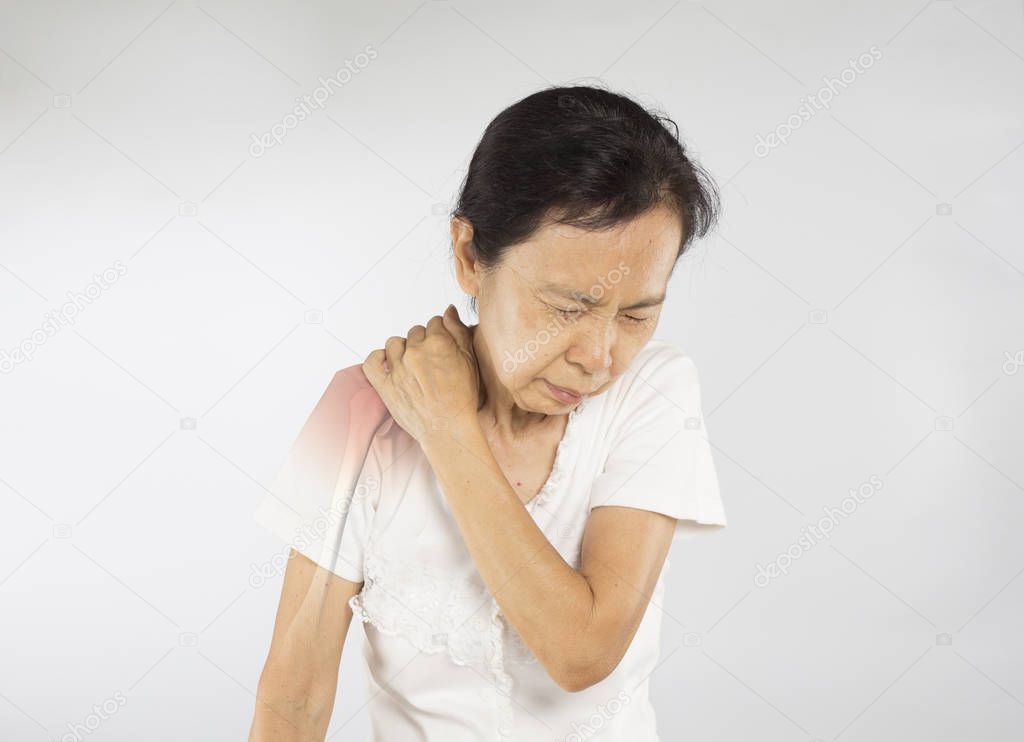 old asian woman feel shoulder bone injury