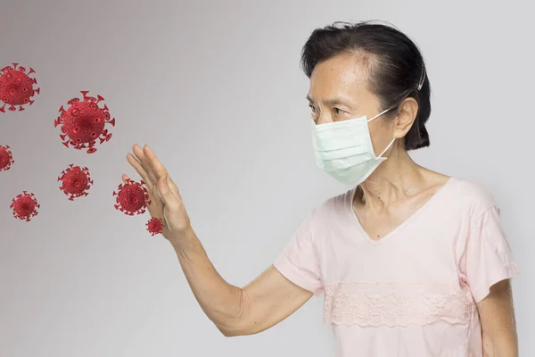 old asian woman touch virus infection feel have fever and sick