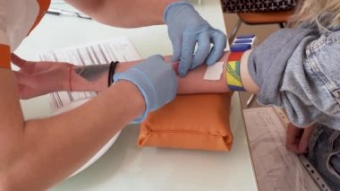 Blood Test Nurse Taking Venous Blood From Young Girl Vein HIV Hepatitis Test