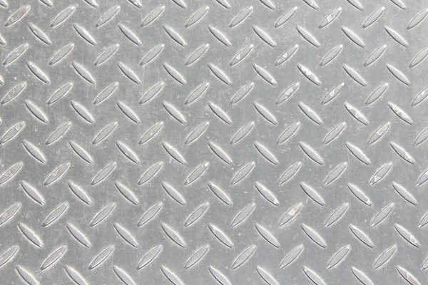 Um fundo de metal ou textura com padrão de placa de piso — Fotografia de Stock