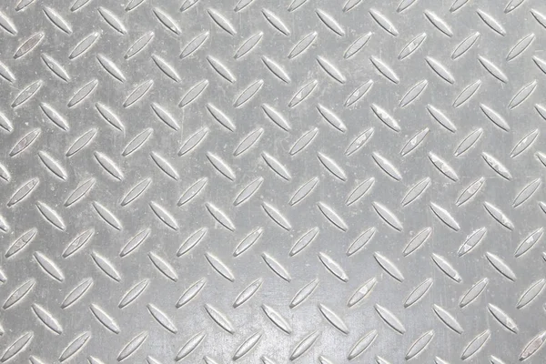 Um fundo de metal ou textura com padrão de placa de piso — Fotografia de Stock