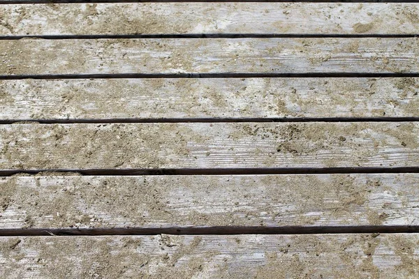 Close up di pontile di legno con sabbia — Foto Stock